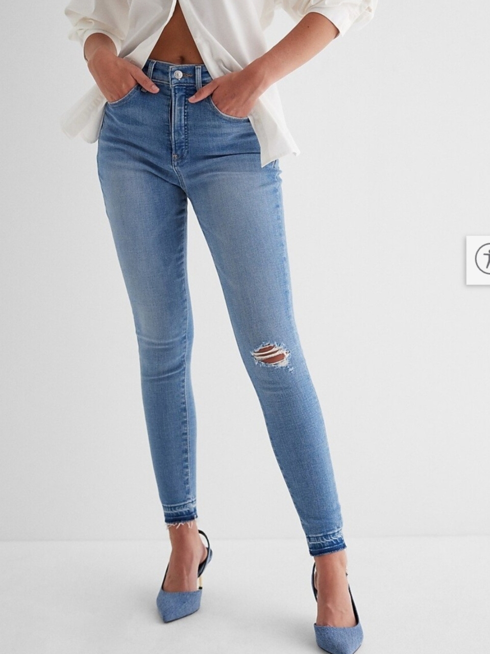Express Light Blue Skinny Jeans with Knee Rip